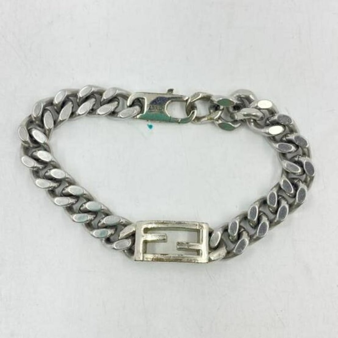 FENDI Baguette Bracelet 7AJ539 size L Fendi: --- Catalog ---Category: SizeLength: 20.3cm / 7.99''Category: DesignType: Charm braceletGender: Men,WomenCategory: GeneralBrand: Fendi--- Item List ---Section: ConditionRanking: Rank B Used - Traces o