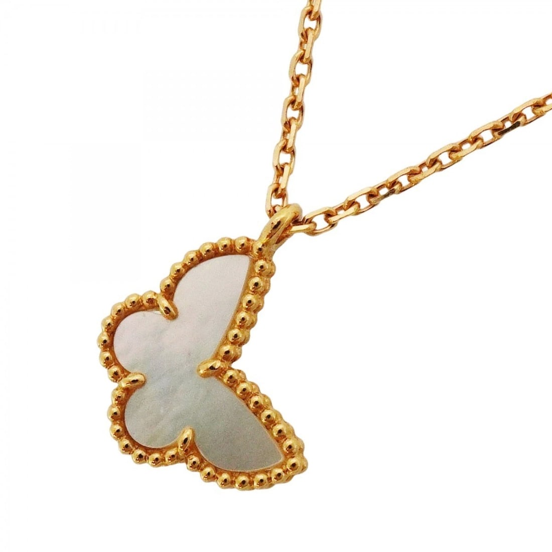 Van Cleef & Arpels Sweet Alhambra Papillon Necklace in 18K Yellow Gold with Mother-of-Pearl for: --- Catalog ---Category: SizePendant Size: 9.7mm x 11.7mm / 0.38'' x 0.46''Neck Circumference: 38 cm - 40 cm / 14.96'' - 15.74''Category: DesignStone: Mother of pearlGender: WomenMaterial: Yellow gold