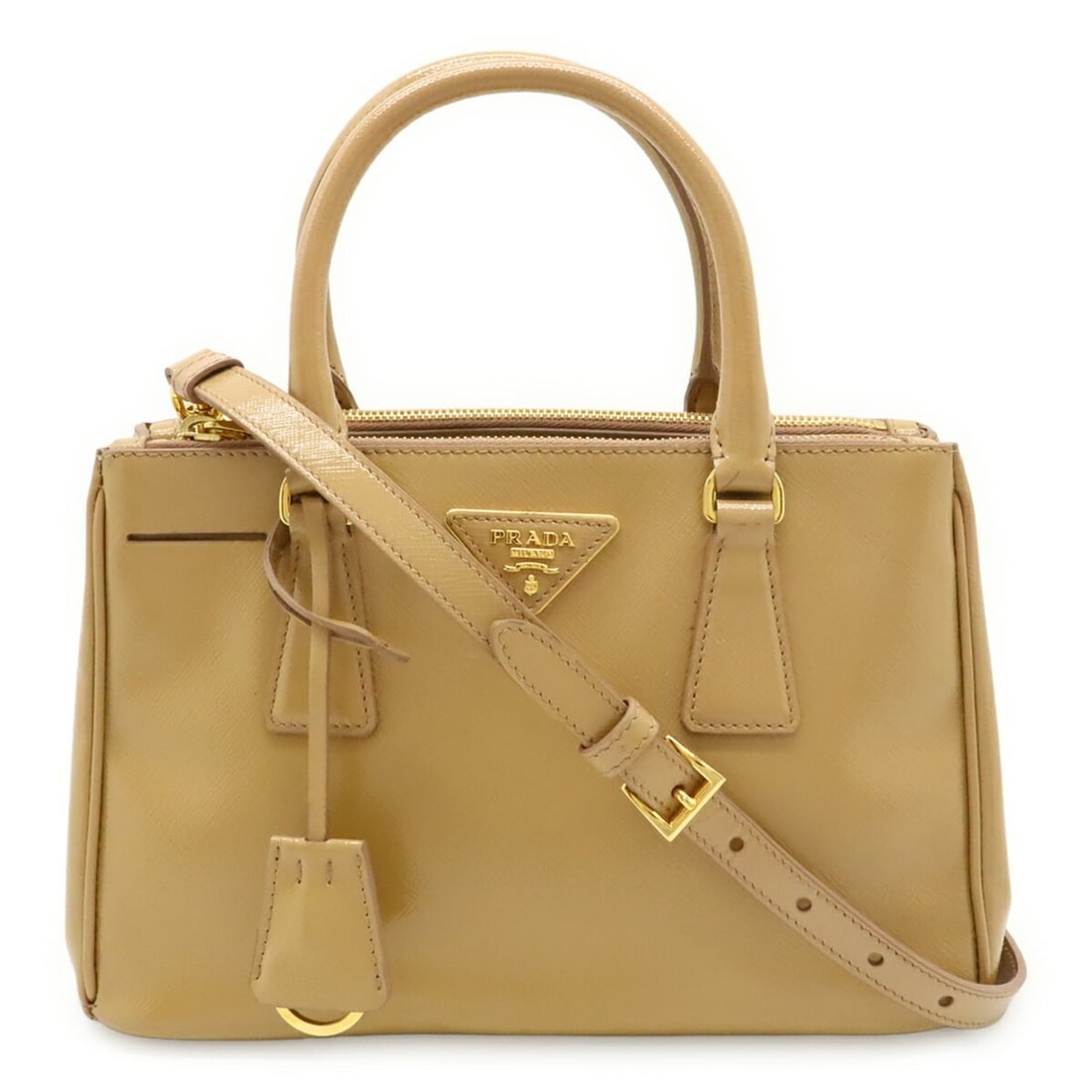 PRADA Galleria handbag/shoulder bag in SAFFIANO VERNIC enamel and patent leather with CAMMEO beige.: --- Catalog ---Category: SizeSize (HxWxD): 17cm x 26.5cm x 10.5cm / 6.69'' x 10.43'' x 4.13''Category: DesignType: Handbag, Shoulder bagColor: BeigeGender: WomenMaterial: Saffiano Category: GeneralBra