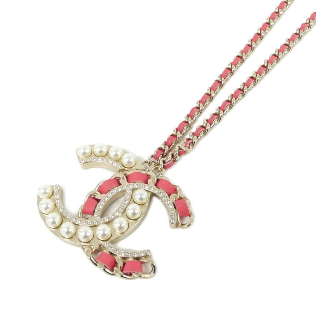Chanel AB0124 Necklace: --- Catalog ---Category: SizePendant Size: 38mm x 50mm / 1.49'' x 1.96''Neck Circumference: 39 cm / 15.35''Category: DesignColor: Gold, Pink, WhiteGender: WomenMaterial: LeatherNecklace Type: