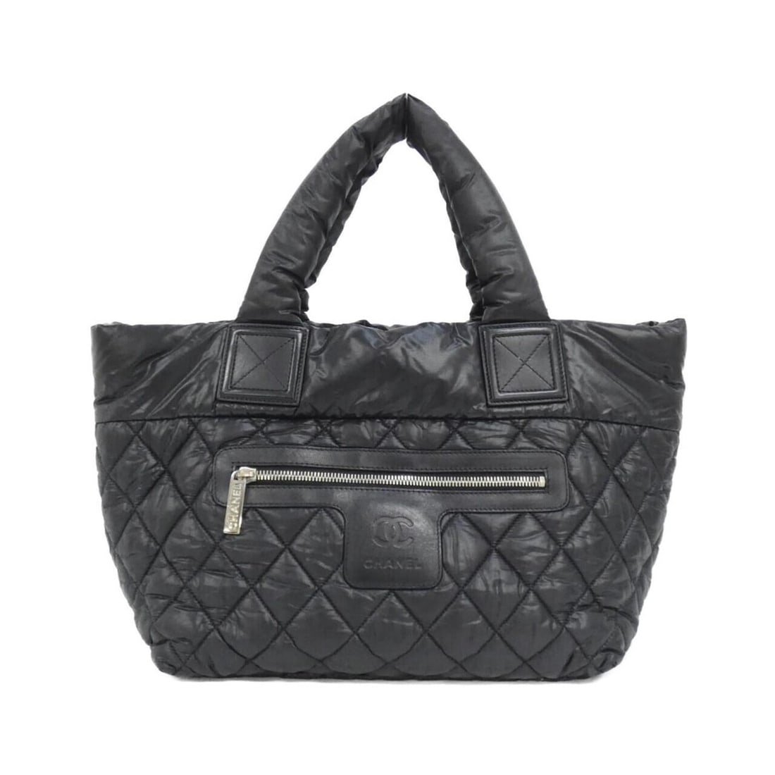 Chanel Coco Cocoon Line 48610 Handbag: --- Catalog ---Category: SizeSize (HxWxD): 24cm x 42cm x 15cm / 9.44'' x 16.53'' x 5.9''Category: DesignType: HandbagColor: BlackGender: WomenMaterial: Nylon Hardware Color: SilverCategory: