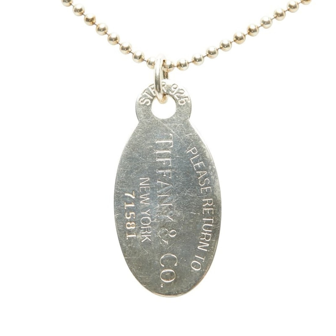 Tiffany Return to Oval Tag Long Necklace in 925 Sterling Silver for Women. TIFFANY & Co.: --- Catalog ---Category: SizePendant Size: 45.9mm x 20.9mm / 1.8'' x 0.82''Neck Circumference: 86.5 cm / 34.05''Category: DesignColor: SilverGender: WomenMaterial: Silver 925Necklace Type: NecklaceCat