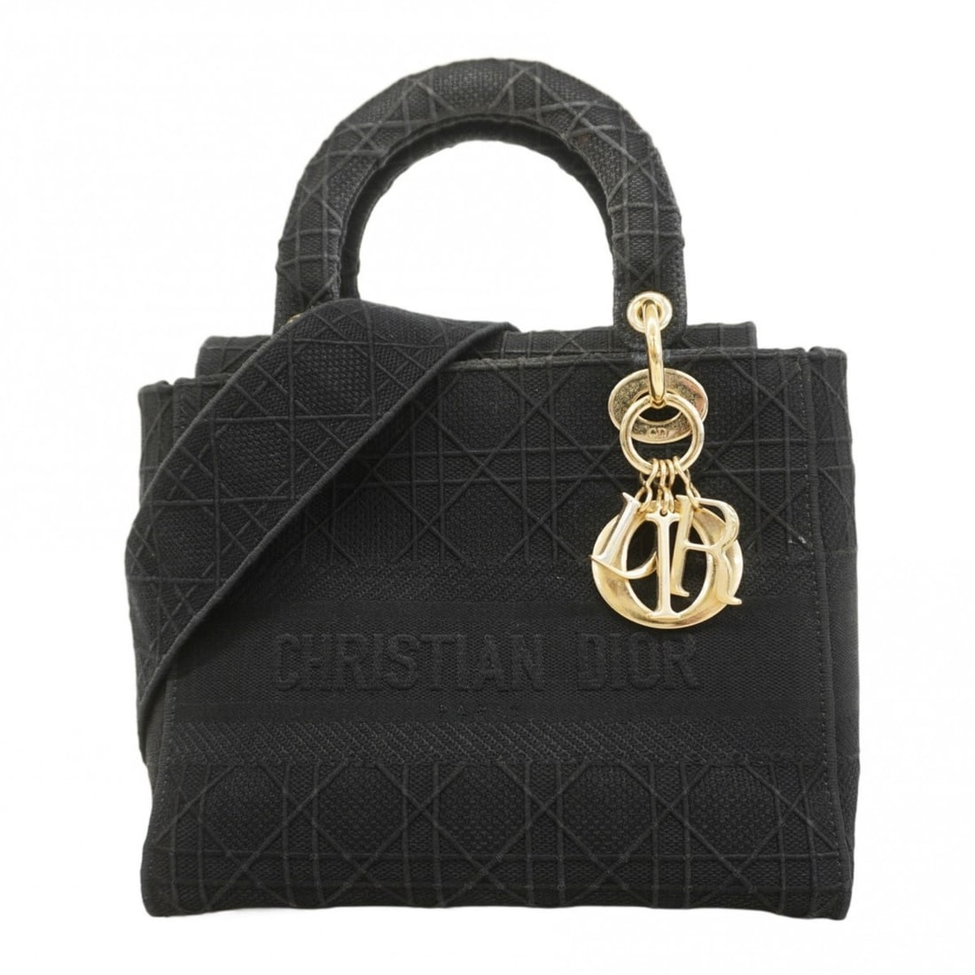 Christian Dior Lady D-Light Canvas Handbag in Black and Champagne, 2-Way Bag for Women: --- Catalog ---Category: SizeSize (HxWxD): 21cm x 23cm x 12cm / 8.26'' x 9.05'' x 4.72''Category: DesignType: HandbagColor: BlackGender: WomenMaterial: Canvas Hardware Color: Champagne goldCategory: G
