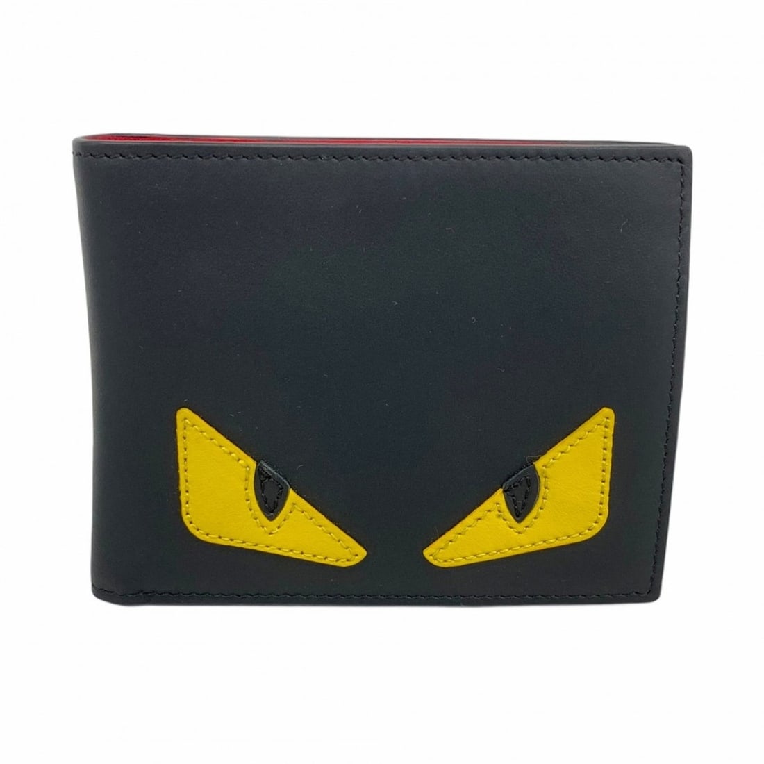 Fendi Monster Leather Wallet Black Men's: --- Catalog ---Category: SizeSize (HxWxD): 9.5cm x 12cm x 1.5cm / 3.74'' x 4.72'' x 0.59''Category: DesignType: Wallet (bi-fold)Color: BlackGender: MenMaterial: Leather Category: GeneralBrand: Fendi--
