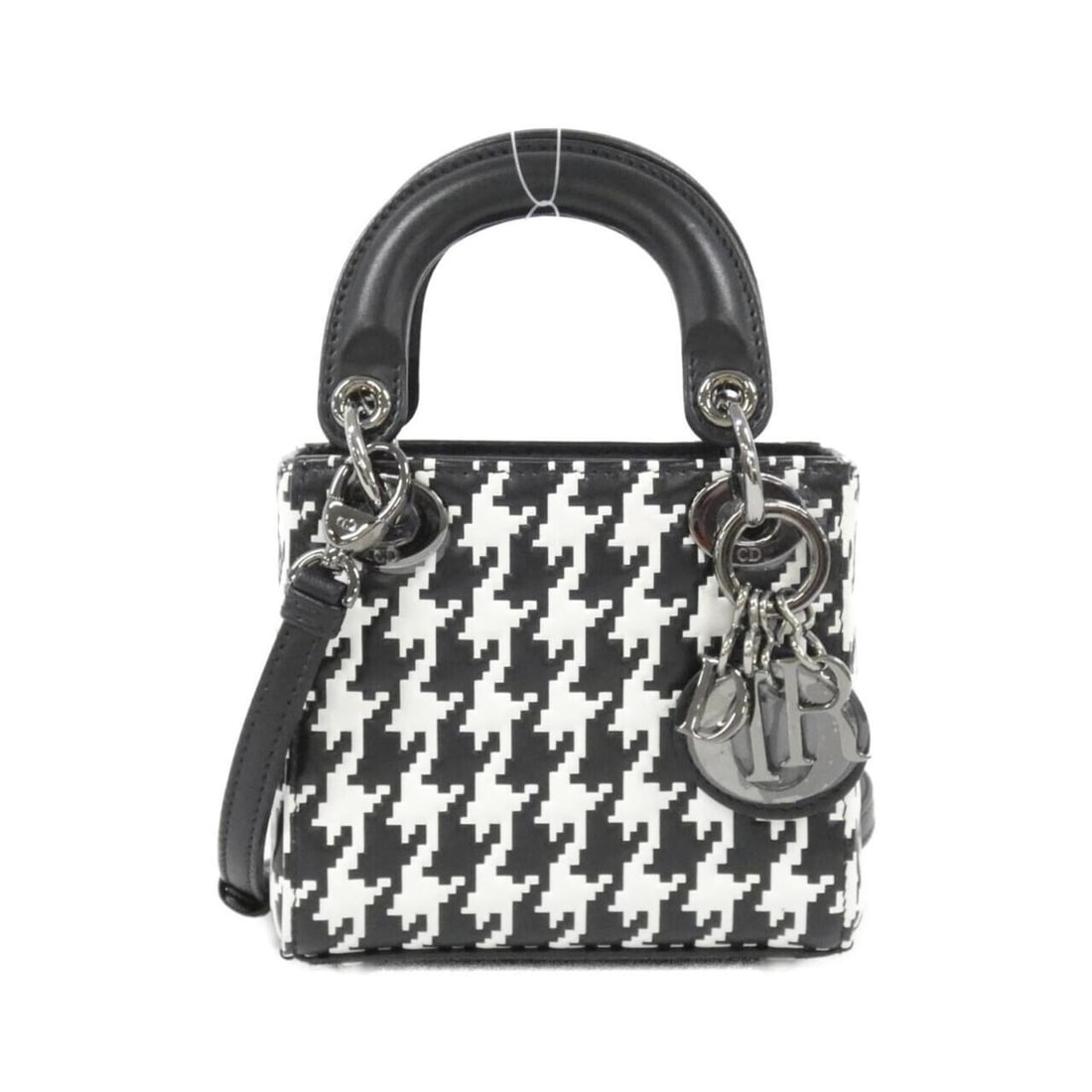 Christian Dior Lady Micro Handbag: --- Catalog ---Category: SizeSize (HxWxD): 10.5cm x 12cm x 5cm / 4.13'' x 4.72'' x 1.96''Category: DesignType: HandbagColor: Black, WhiteGender: WomenMaterial: Leather Category: GeneralBrand: Christia