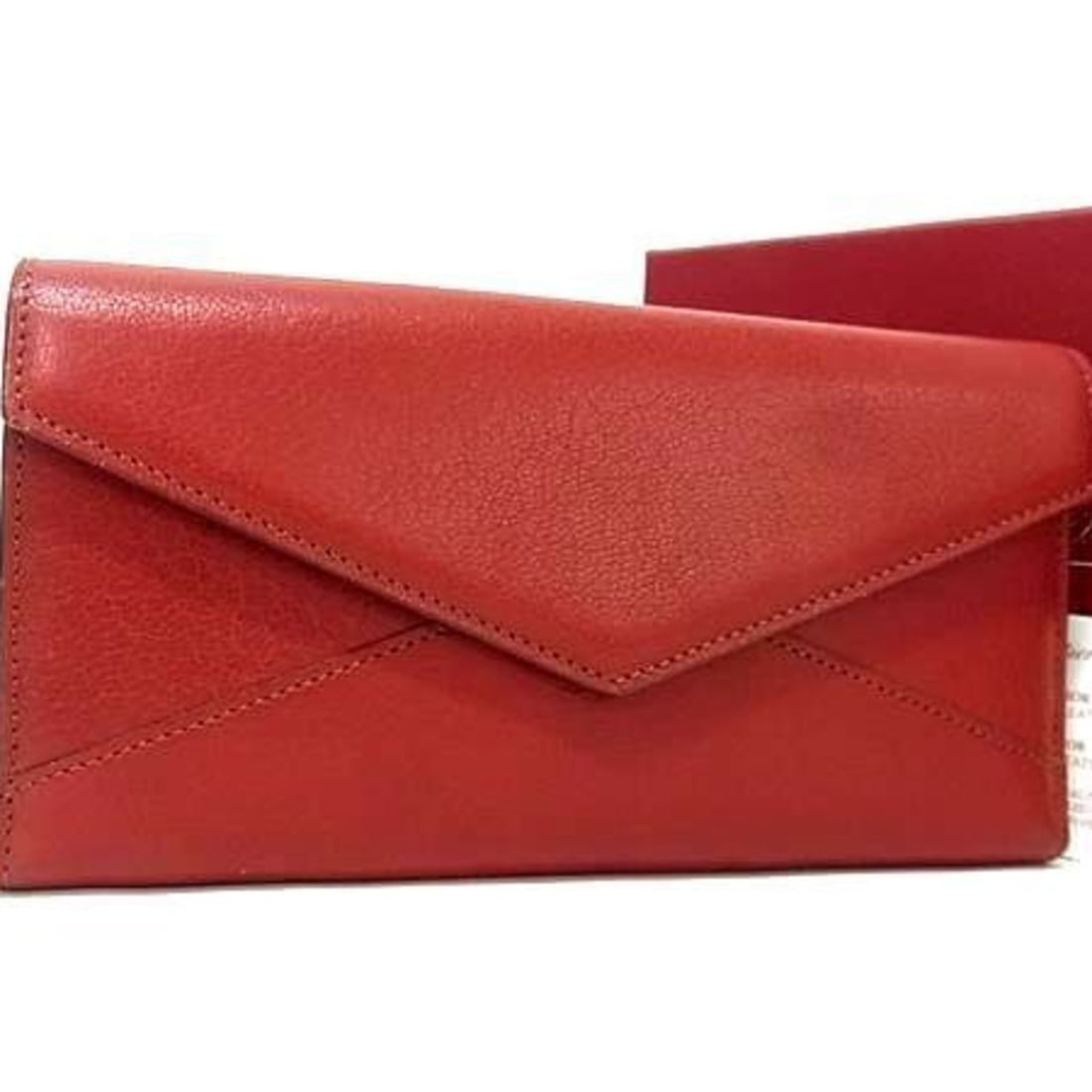 Cartier Les Musts Red Leather Tri-fold Long Wallet for Women: --- Catalog ---Category: SizeSize (HxWxD): 9cm x 18.5cm x 1.5cm / 3.54'' x 7.28'' x 0.59''Category: DesignType: Long wallet (tri-fold)Color: Red colorGender: WomenMaterial: Leather Category: GeneralLi