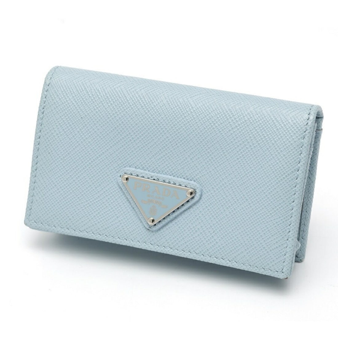 PRADA Saffiano Triangle Card Case/Business Holder 1MC122 Leather Light Blue T-159700: --- Catalog ---Category: DesignType: Card caseColor: Light blueGender: WomenMaterial: Saffiano triangle Category: GeneralMPN: 1MC122Brand: PradaCountry of Origin: ItalyCategory: Physical PropertiesSiz