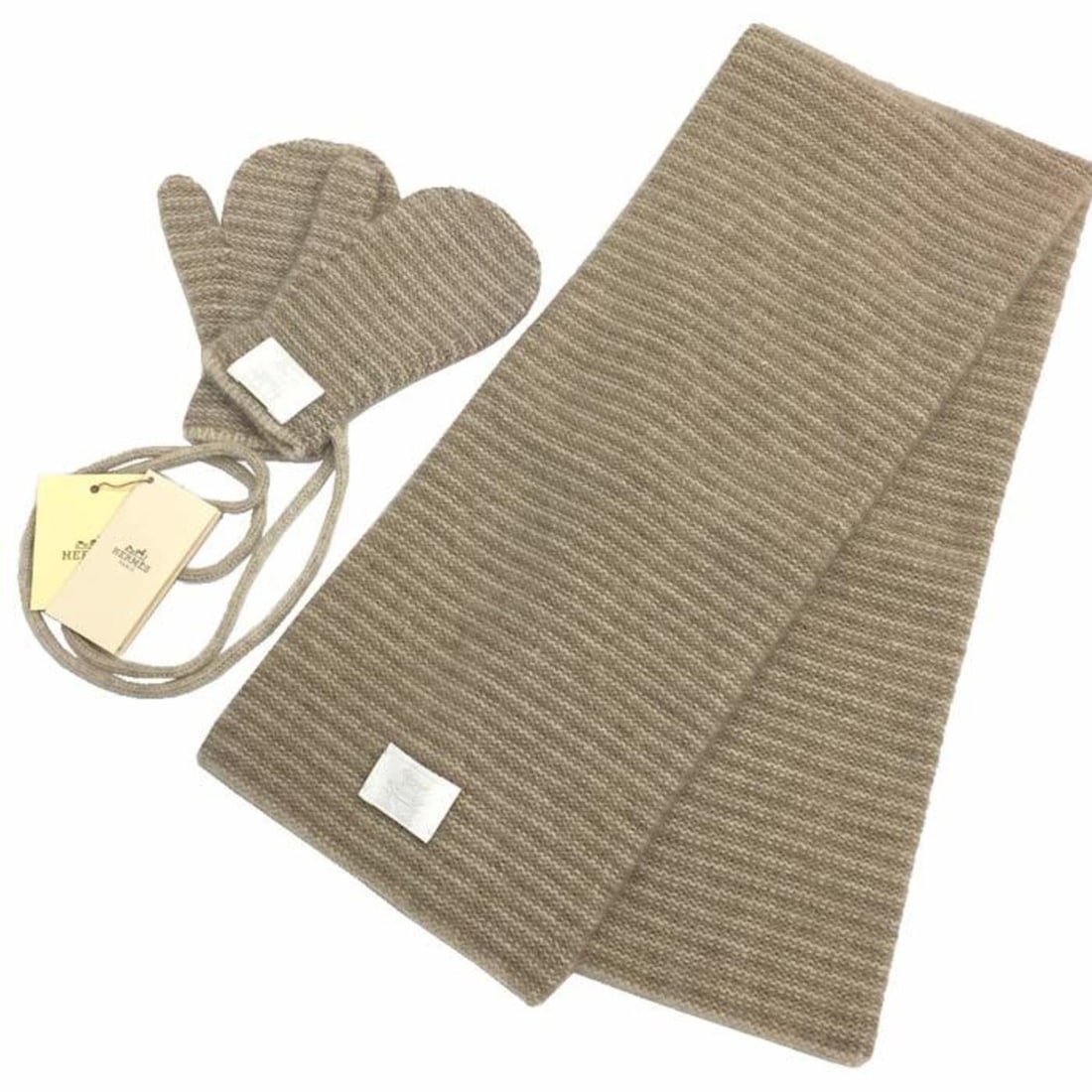 HERMES MOUFLES+CORDON JET AIME Scarf and Glove Set, 100% Cashmere, Baby/Kids, 101333M-03, Beige: --- Catalog ---Category: SizeSize (LxW): 14.5cm x 73cm / 5.7'' x 28.74''Category: DesignType: StoleColor: BeigeGender: Girls,BoysMaterial: Cashmere 100%Category: GeneralBrand: HermesCountry of Origin: