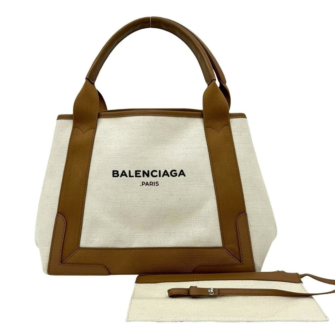BALENCIAGA Navy Cabas S Logo Canvas and Leather Handbag/Tote Bag in Brown Ivory (1471-5): --- Catalog ---Category: SizeSize (HxWxD): 23cm x 30cm x 17.5cm / 9.05'' x 11.81'' x 6.88''Category: DesignType: Handbag, Tote bagColor: Brown, IvoryGender: WomenMaterial: Canvas , Leather Category: G