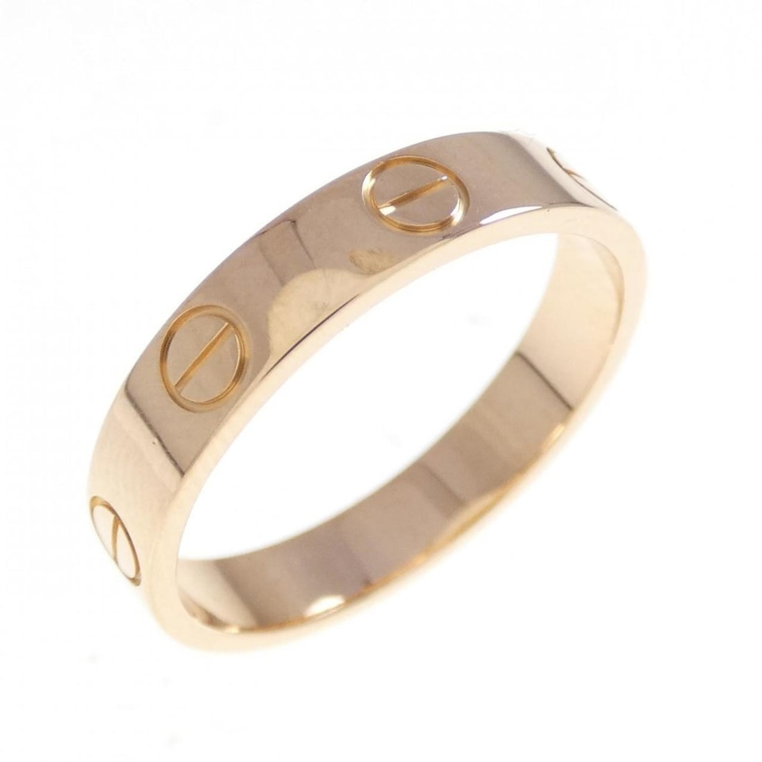 Cartier Mini Love Ring: --- Catalog ---Category: SizeUS Size: 6.5Brand Size: 52Category: DesignType: Band ringGender: WomenMaterial: Pink gold (18K)Category: GeneralMPN: B4085200Brand: Cartier--- Item List ---Section: Condit