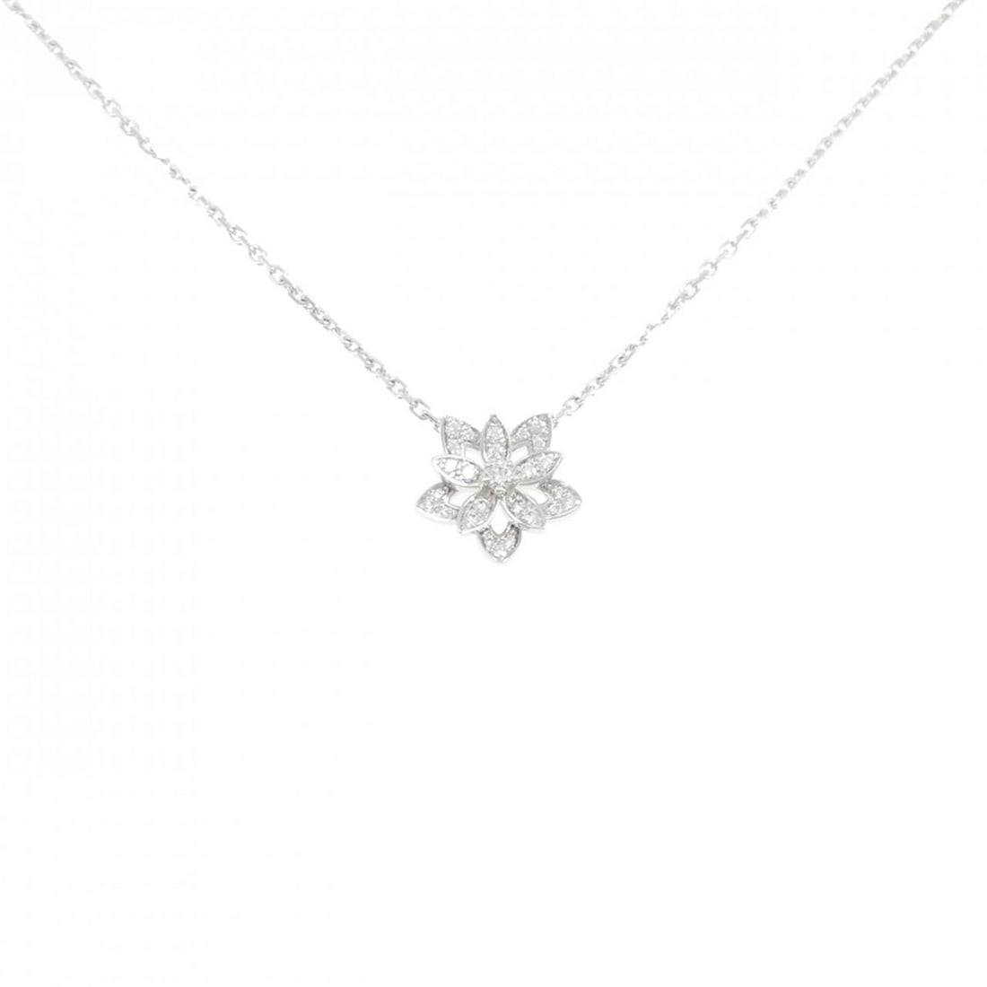 Van Cleef & Arpels Lotus Mini Necklace: --- Catalog ---Category: SizePendant Size: 11.5mm x 12mm / 0.45'' x 0.47''Neck Circumference: 38 cm - 42 cm / 14.96'' - 16.53''Category: DesignStone: DiamondGender: WomenMaterial: White gold (18K)Pend