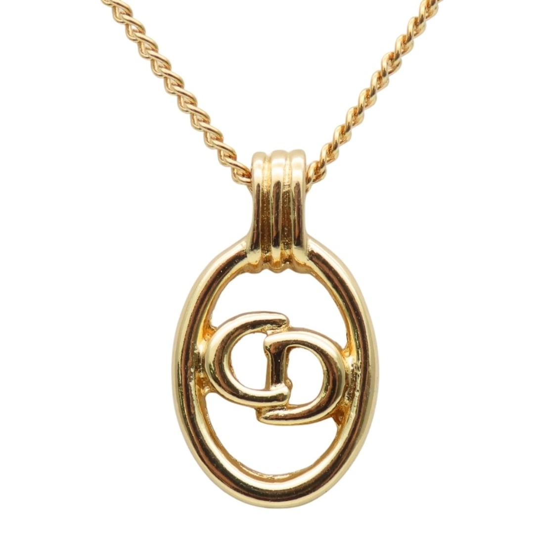 Christian Dior CD logo necklace in gold-plated metal. GP. Women's.: --- Catalog ---Category: SizeWeight: 4.7g / 0.16oz.Pendant Size: 21.2mm x 12.2mm / 0.83'' x 0.48''Neck Circumference: 43.5 cm / 17.12''Category: DesignColor: GoldGender: WomenMaterial: MetalNecklace T