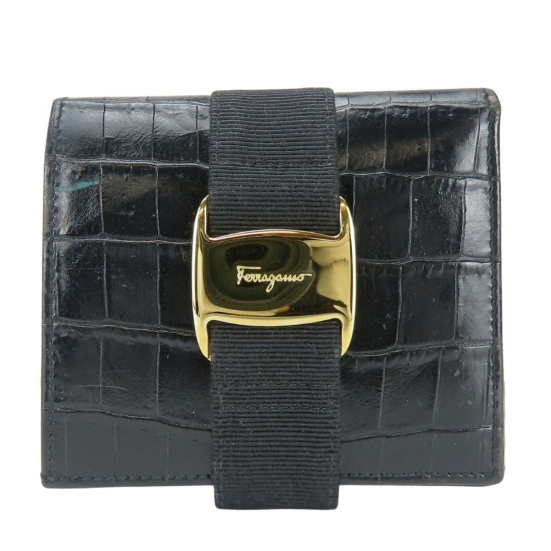 Salvatore Ferragamo Women's Vara Bifold Wallet 223053 in Black Leather with Gold Hardware and: --- Catalog ---Category: SizeWeight: 85g / 2.99oz.Size (HxWxD): 9cm x 10cm x 2cm / 3.54'' x 3.93'' x 0.78''Category: DesignType: Wallet (bi-fold)Color: BlackGender: WomenMaterial: Leather Leather/Fur