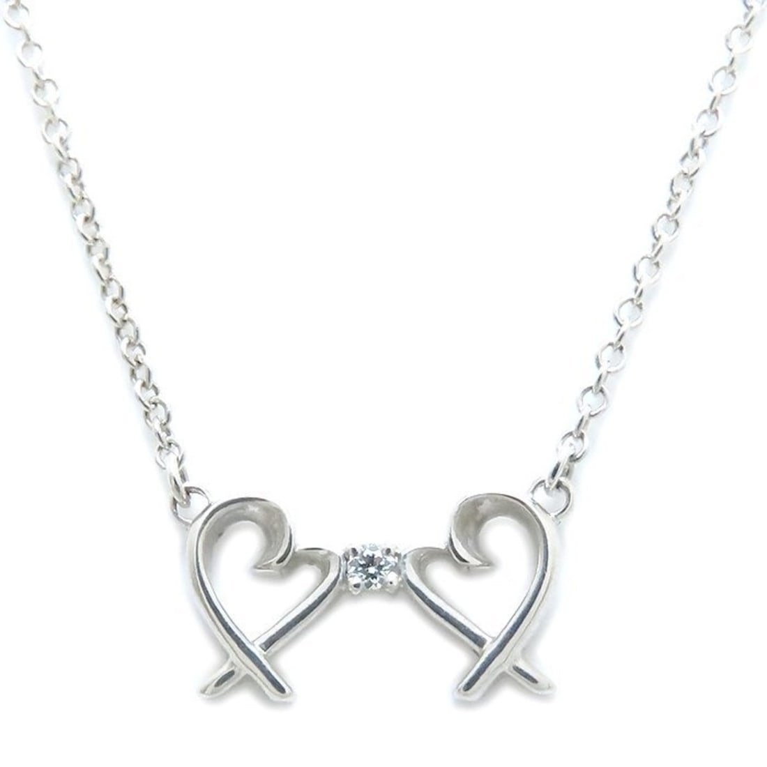 TIFFANY & Co. Tiffany Double Loving Heart Necklace with 1 Diamond and Paloma Picasso Sterling Silver: --- Catalog ---Category: SizePendant Size: 6.7mm x 11.8mm / 0.26'' x 0.46''Neck Circumference: 40.5 cm / 15.94''Category: DesignColor: SilverGender: WomenMaterial: Silver 925Necklace Type: NecklaceCat