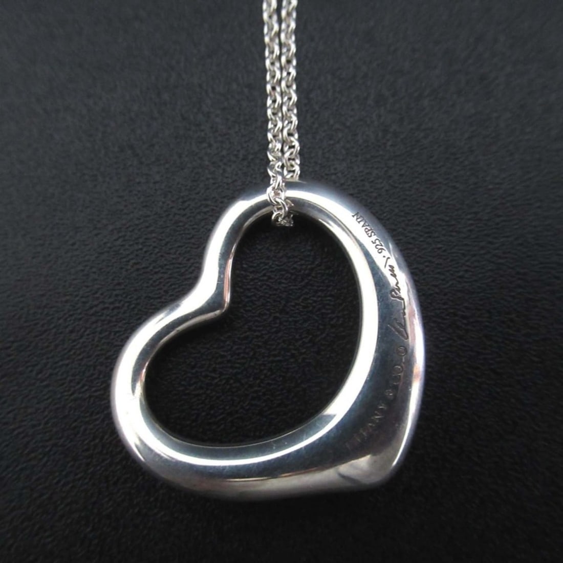 Tiffany & Co. Elsa Peretti Open Heart Large Necklace Pendant in 925 SV Silver for Women: --- Catalog ---Category: SizeWeight: 10g / 0.35oz.Pendant Size: 26mm x 26mm / 1.02'' x 1.02''Neck Circumference: 46.5 cm / 18.3''Category: DesignColor: SilverGender: WomenMaterial: Silver 925Pendant T