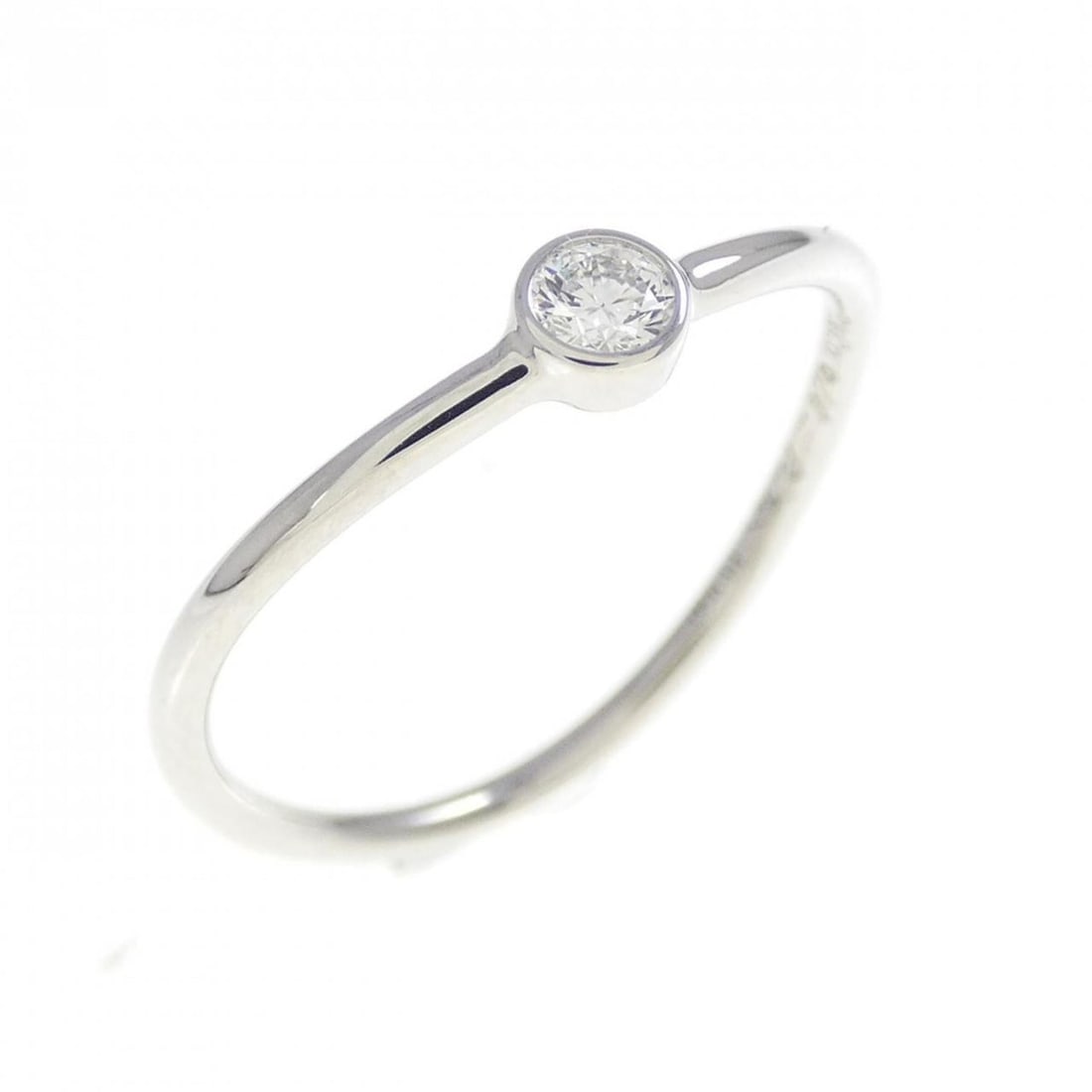 Tiffany Wave Single Row Ring: --- Catalog ---Category: SizeUS Size: 9.5Brand Size: 5Category: DesignType: Band ringColor: PlatinumStone: DiamondGender: WomenMaterial: Platinum 950Category: GeneralBrand: Tiffany--- Item List ---Sec