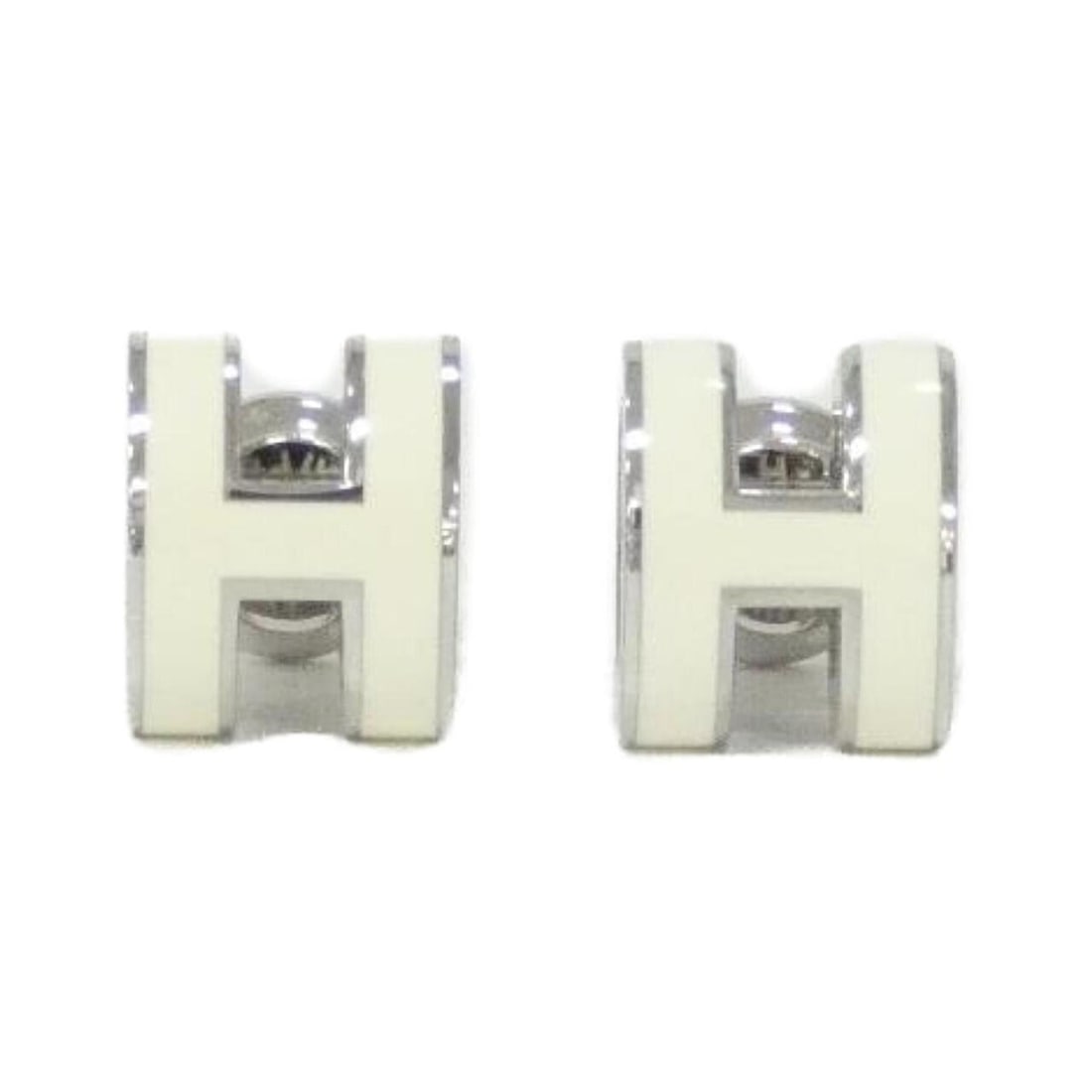 Hermes Hermès Pop Ash Mini 608002FP Earrings: --- Catalog ---Category: SizeSize (HxWxD): 9.00mm x 7.00mm / 0.35'' x 0.28''Category: DesignType: Stud earringsColor: Silver, WhiteGender: WomenCategory: GeneralMPN: 608002FPBrand: Hermes--- Item