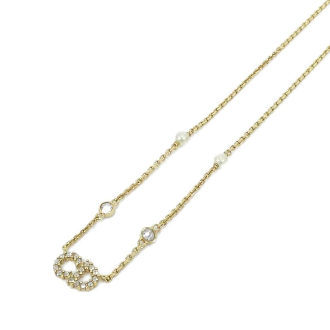 Christian Dior Clair D'Lune N1033CDLCY Necklace: --- Catalog ---Category: SizePendant Size: 7mm x 13mm / 0.27'' x 0.51''Neck Circumference: 38 cm - 41 cm / 14.96'' - 16.14''Category: DesignColor: Clear, Gold, WhiteGender: WomenNecklace Type: