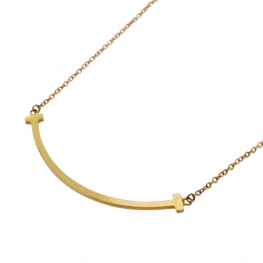 Tiffany T Smile Small Necklace in 18KYG Yellow Gold for Women: --- Catalog ---Category: SizePendant Size: 10mm x 37.7mm / 0.39'' x 1.48''Neck Circumference: 41 cm - 45 cm / 16.14'' - 17.71''Category: DesignGender: WomenMaterial: Yellow gold (18K)Necklace Type: Ne