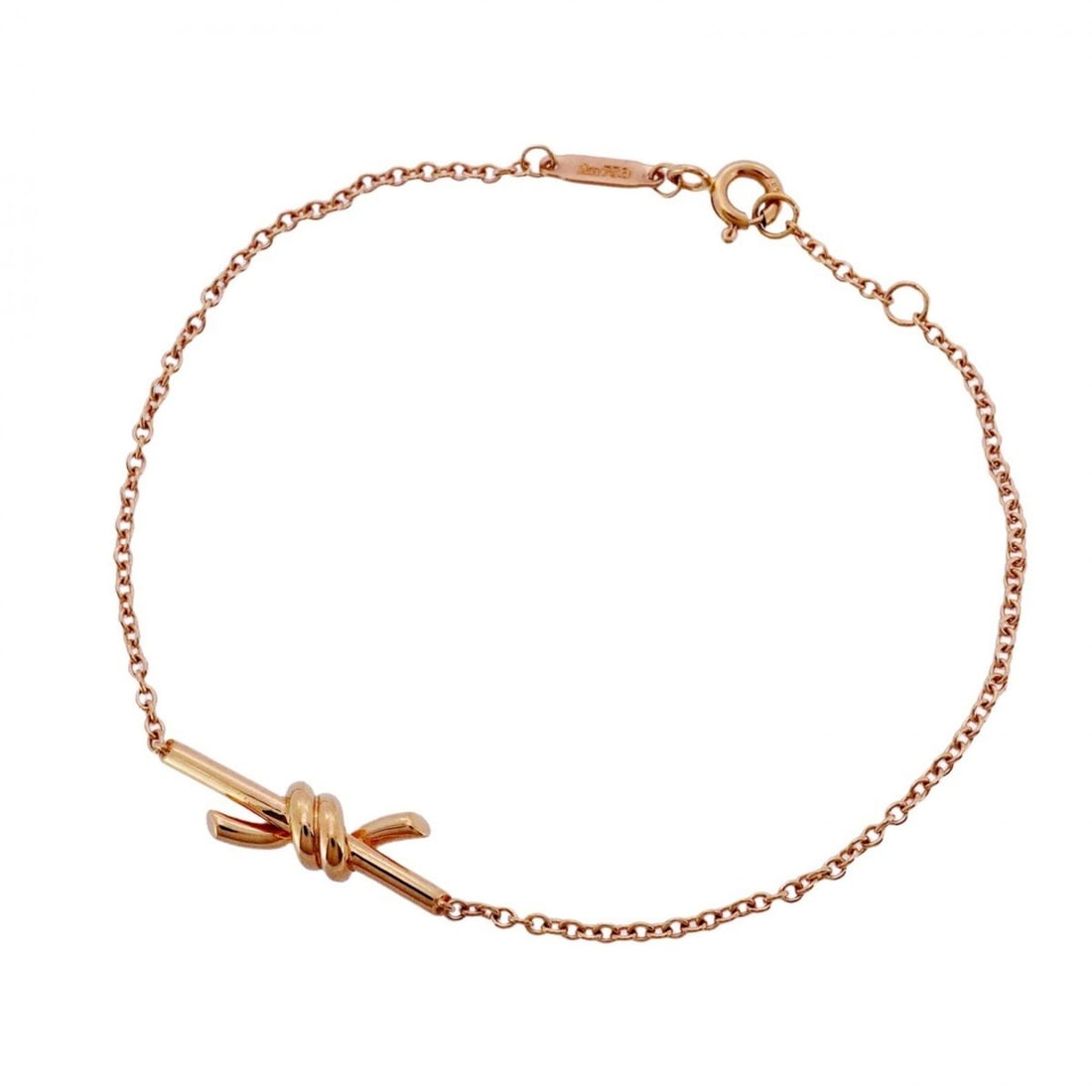 Tiffany Knot Bracelet in 18K Pink Gold for Women: --- Catalog ---Category: SizeLength: 16.5cm - 17.5cm / 6.49'' - 6.88''Category: DesignType: Charm braceletGender: WomenMaterial: Pink gold (18K)Category: GeneralBrand: Tiffany--- Item List ---Section: