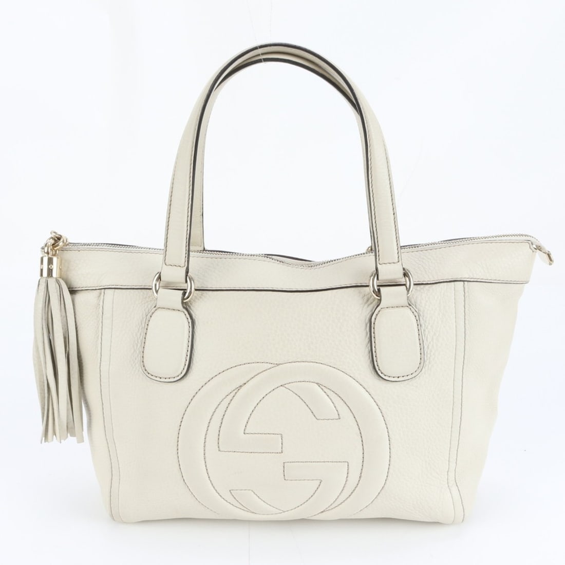 Gucci Soho Interlocking G Tassel Leather Tote Bag (282307) for Women: --- Catalog ---Category: SizeSize (HxWxD): 24cm x 29cm x 12cm / 9.44'' x 11.41'' x 4.72''Strap Length: 46cm / 18.11''Category: DesignType: Tote bagColor: IvoryGender: WomenMaterial: Leather Category: