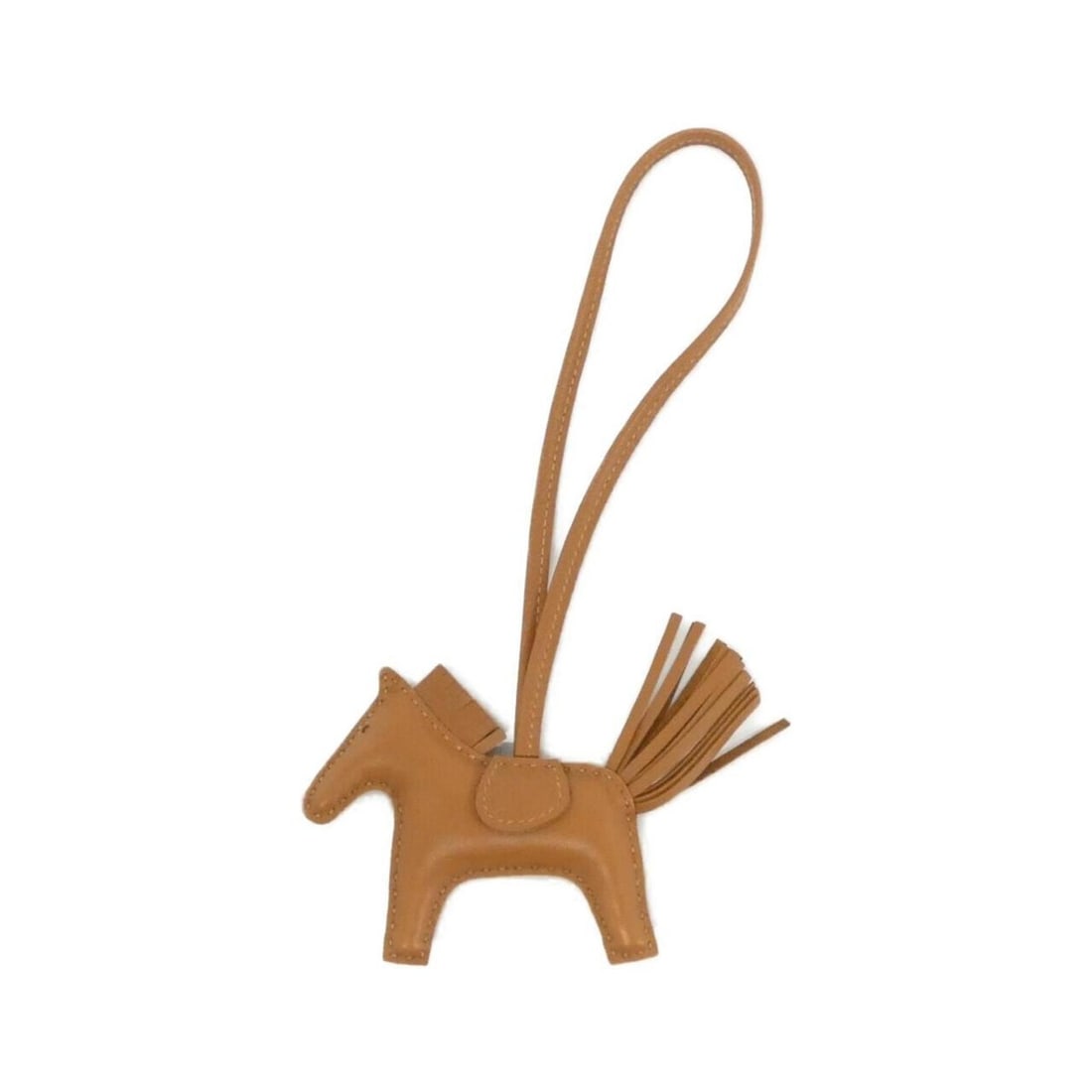 Hermes Rodeo Accessory Handbag Charm PM 064929CA: --- Catalog ---Category: SizeSize (HxWxD): 75.00mm x 85.00mm / 2.95'' x 3.35''Category: DesignType: Handbag charmColor: GoldGender: Men,WomenMaterial: Agneau MiloCategory: GeneralBrand: Hermes--- Item