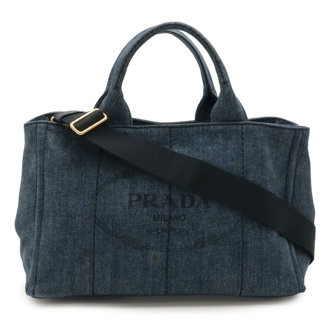 PRADA CANAPA AVIO Denim Canvas Tote/Shoulder Bag in Blue (B2642B): --- Catalog ---Category: SizeWeight: 1.1kg / 2.42lb.Size (HxWxD): 23cm x 35cm x 22.5cm / 9.05'' x 13.77'' x 8.85''Strap Length: 127cm / 49.99''Category: DesignType: Shoulder bag, Tote bagColor: BlueSt