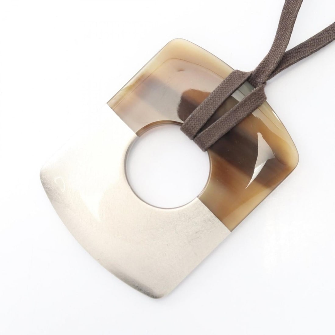 Hermes Hermès Dalva Necklace Jewelry Buffalo Horn Lacquer Women's Brown and Silver: --- Catalog ---Category: SizePendant Size: 85mm x 65mm / 3.34'' x 2.55''Neck Circumference: 64 cm / 25.19''Category: DesignColor: Brown, SilverGender: WomenMaterial: Buffalo horn, LacquerNecklace Type