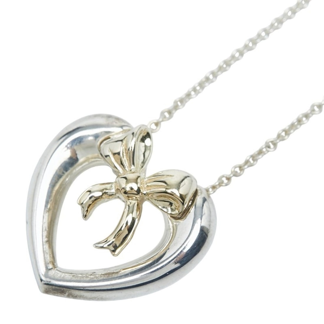 Tiffany Heart and Ribbon Combination Necklace in SV925 Silver 18K Yellow Gold. Women's. TIFFANY &: --- Catalog ---Category: SizePendant Size: 17.3mm x 18mm / 0.68'' x 0.7''Neck Circumference: 41.5 cm / 16.33''Category: DesignColor: Silver, YellowGender: WomenMaterial: Silver 925, Yellow gold