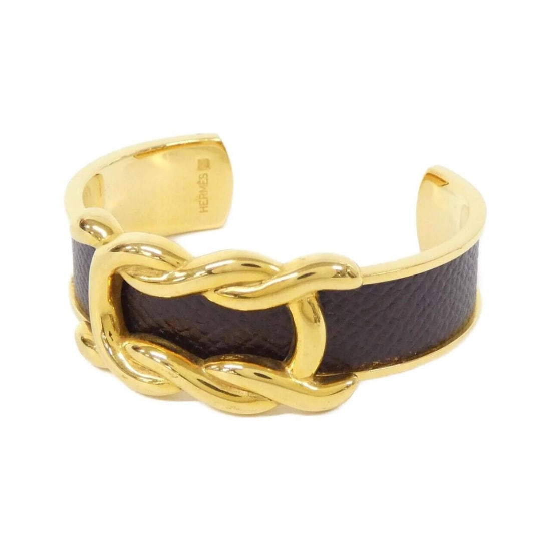 Hermes Knot Bangle: --- Catalog ---Category: SizeWidth: 2.2cm / 0.86''Length: 16cm / 6.29''Category: DesignType: BangleColor: EbeneGender: WomenMaterial: Courchevel leatherCategory: GeneralBrand: Hermes--- Item List ---S