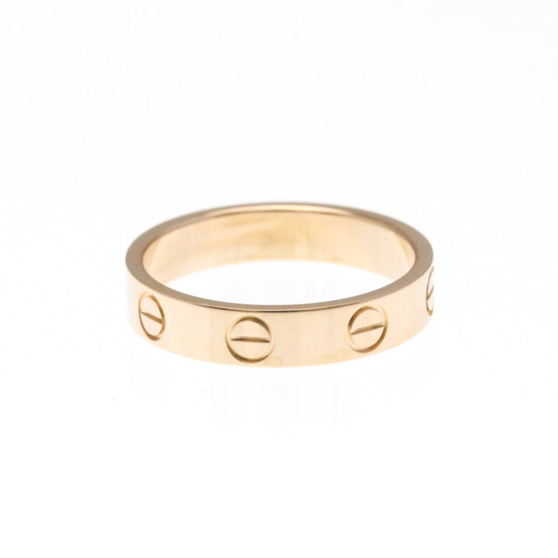 Cartier Mini Love Ring Pink Gold (18K) Fashion No Stone Band Ring Pink Gold: --- Catalog ---Category: SizeWidth: 3.7mm / 0.15''Weight: 3g / 0.1oz.JP Size: 9US Size: 4 3/4Brand Size: 49Category: DesignType: Band ringColor: Pink goldMetal: GoldStone: No StoneStyle: FashionGender