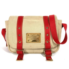 LOUIS VUITTON Antigua Busas PM M40041, a messenger bag with flap and shoulder strap, available in