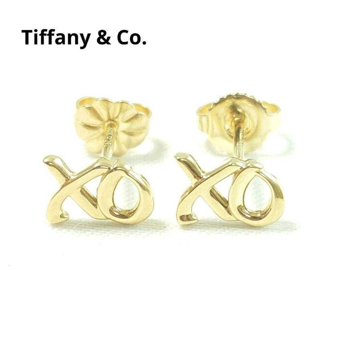 Tiffany & Co. 18K Love Kiss Earrings 7081: --- Catalog ---Category: SizeSize (HxWxD): 5.90mm x 8.80mm / 0.23'' x 0.35''Category: DesignType: Stud earringsGender: WomenMaterial: Yellow gold (18K)Category: GeneralBrand: Tiffany--- Item List