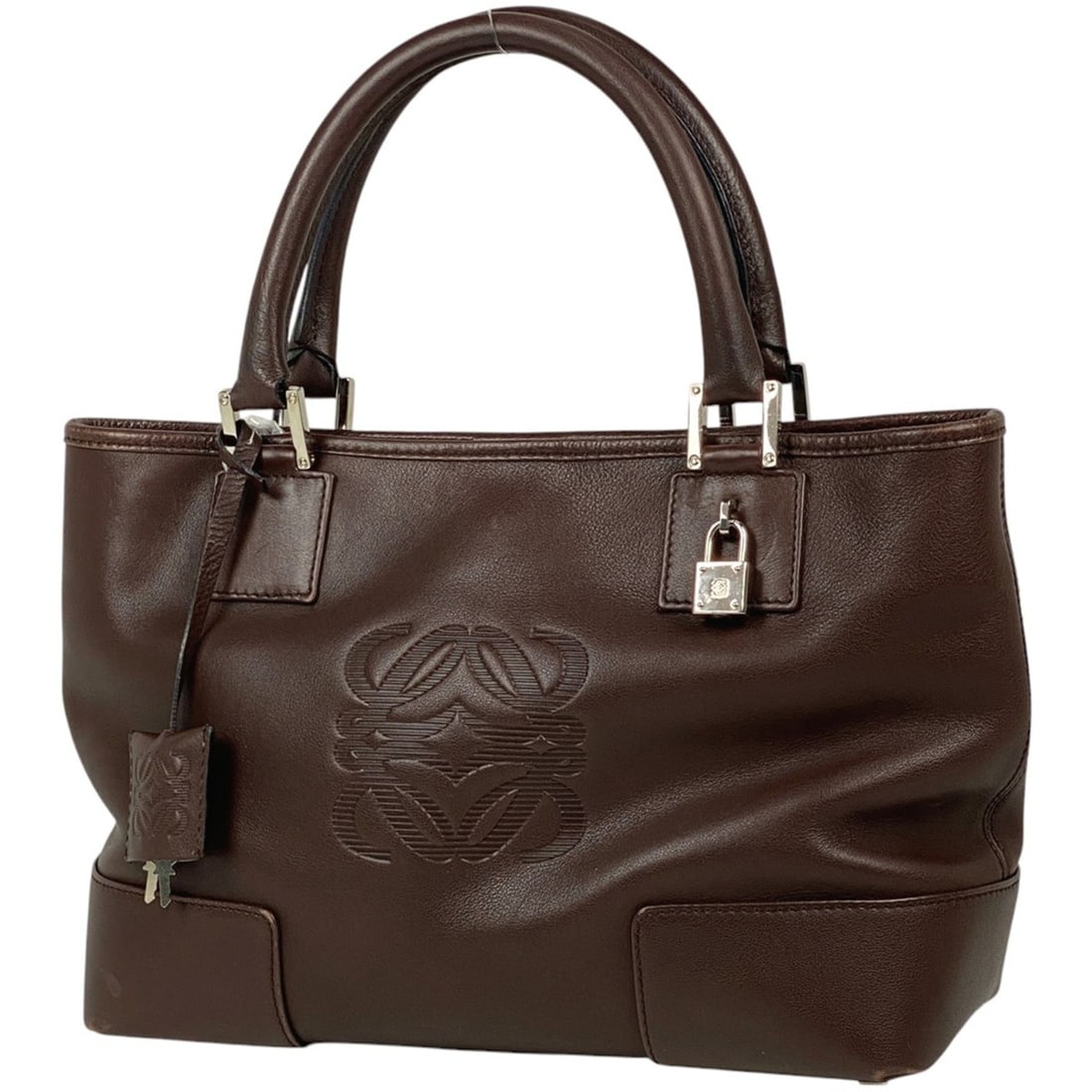 LOEWE Amazona Fusta Anagram Tote Bag, Brown Leather, Women's: --- Catalog ---Category: SizeSize (HxWxD): 21cm x 29.5cm x 12cm / 8.26'' x 11.61'' x 4.72''Category: DesignType: Handbag, Tote bagColor: BrownGender: WomenMaterial: Leather Category: GeneralLine: Amaz