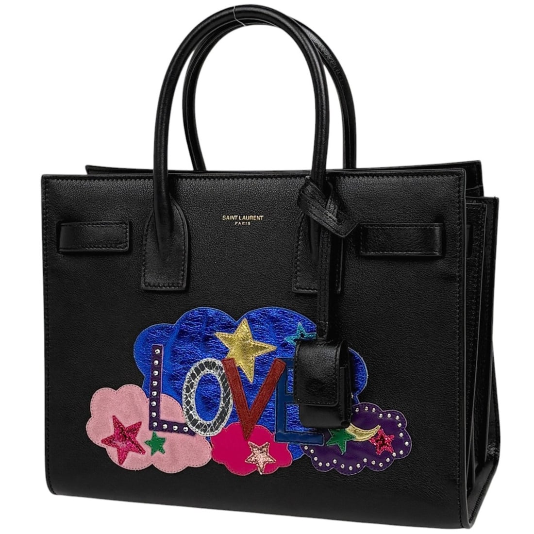 Saint Laurent Sac de Jour handbag with star patchwork, black leather, 413047, for women: --- Catalog ---Category: SizeSize (HxWxD): 20cm x 26cm x 12cm / 7.87'' x 10.23'' x 4.72''Category: DesignType: HandbagColor: BlackGender: WomenMaterial: Leather Category: GeneralBrand: Saint Laurent--