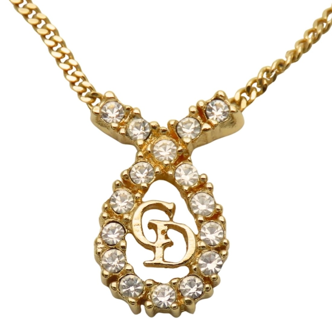 Christian Dior CD logo necklace in gold-plated metal. GP. Women's.: --- Catalog ---Category: SizeWeight: 4.6g / 0.16oz.Pendant Size: 18mm x 11.9mm / 0.7'' x 0.46''Neck Circumference: 43 cm / 16.92''Category: DesignColor: GoldStone: RhinestoneGender: WomenMaterial: Met
