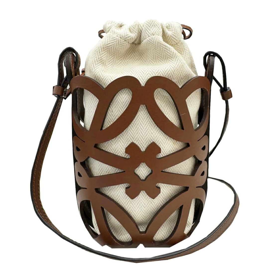 LOEWE Cutout Pocket Anagram Shoulder Bag in Canvas and Leather for Women: --- Catalog ---Category: SizeSize (HxWxD): 19cm x 12cm x 9cm / 7.48'' x 4.72'' x 3.54''Strap Length: 107cm / 42.12''Category: DesignType: Shoulder bagColor: Brown, IvoryGender: WomenMaterial: Canvas ,