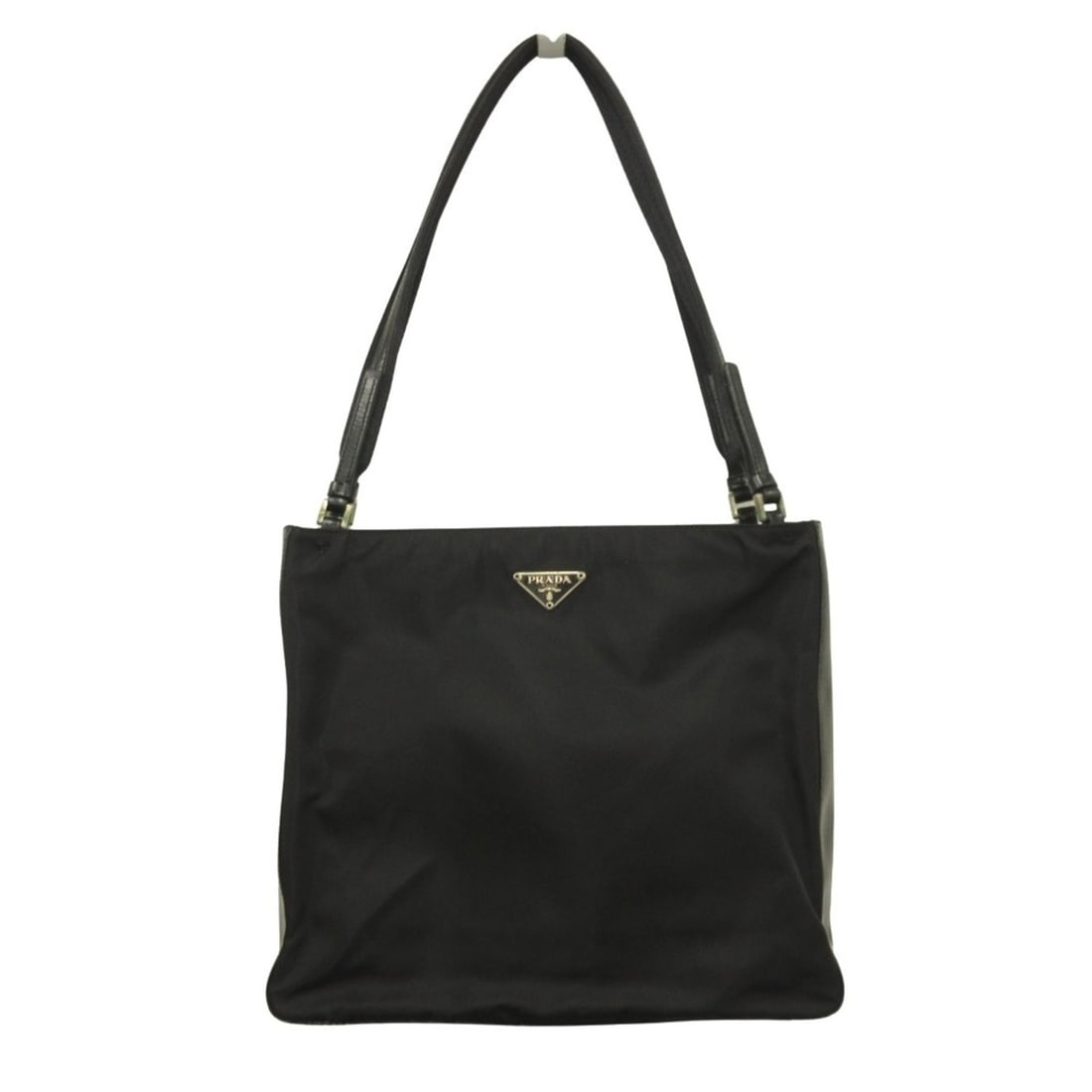 PRADA Prada nylon and leather tote handbag with triangle logo in black for men women: --- Catalog ---Category: SizeSize (HxWxD): 25cm x 29cm x 9cm / 9.84'' x 11.41'' x 3.54''Category: DesignType: HandbagColor: BlackGender: Men,WomenMaterial: Nylon , Leather Category: GeneralBrand: Prad