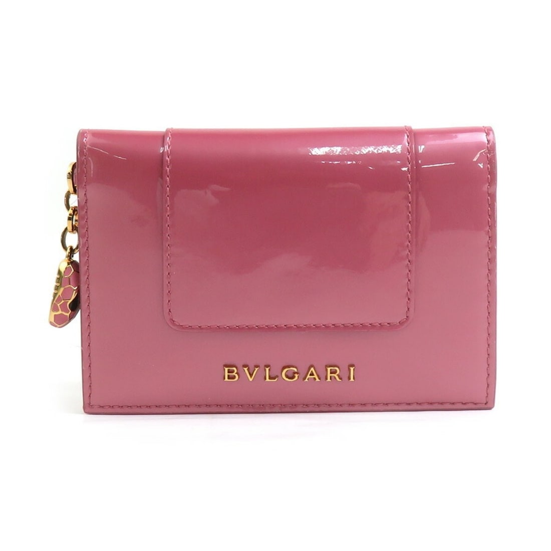 BVLGARI Serpenti Business Card Case in Patent Leather with Metallic Pink and Gold, Women's, e61365i: --- Catalog ---Category: DesignType: Card caseColor: Metallic pinkGender: WomenMaterial: Patent leather Category: GeneralBrand: BvlgariCountry of Origin: ItalyCategory: Physical PropertiesSize (HxWxD)