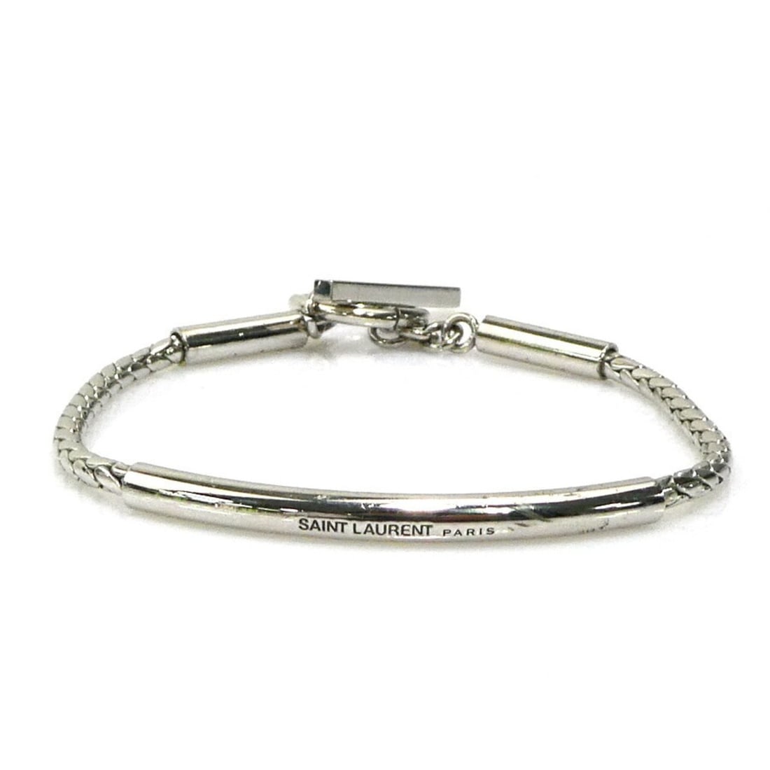 Saint Laurent bracelet in silver, unisex, h31876k: --- Catalog ---Category: SizeLength: 17cm / 6.69''Category: DesignType: Charm braceletColor: SilverGender: Women,MenMaterial: MetalCategory: GeneralBrand: Saint Laurent--- Item List ---Section: Condit