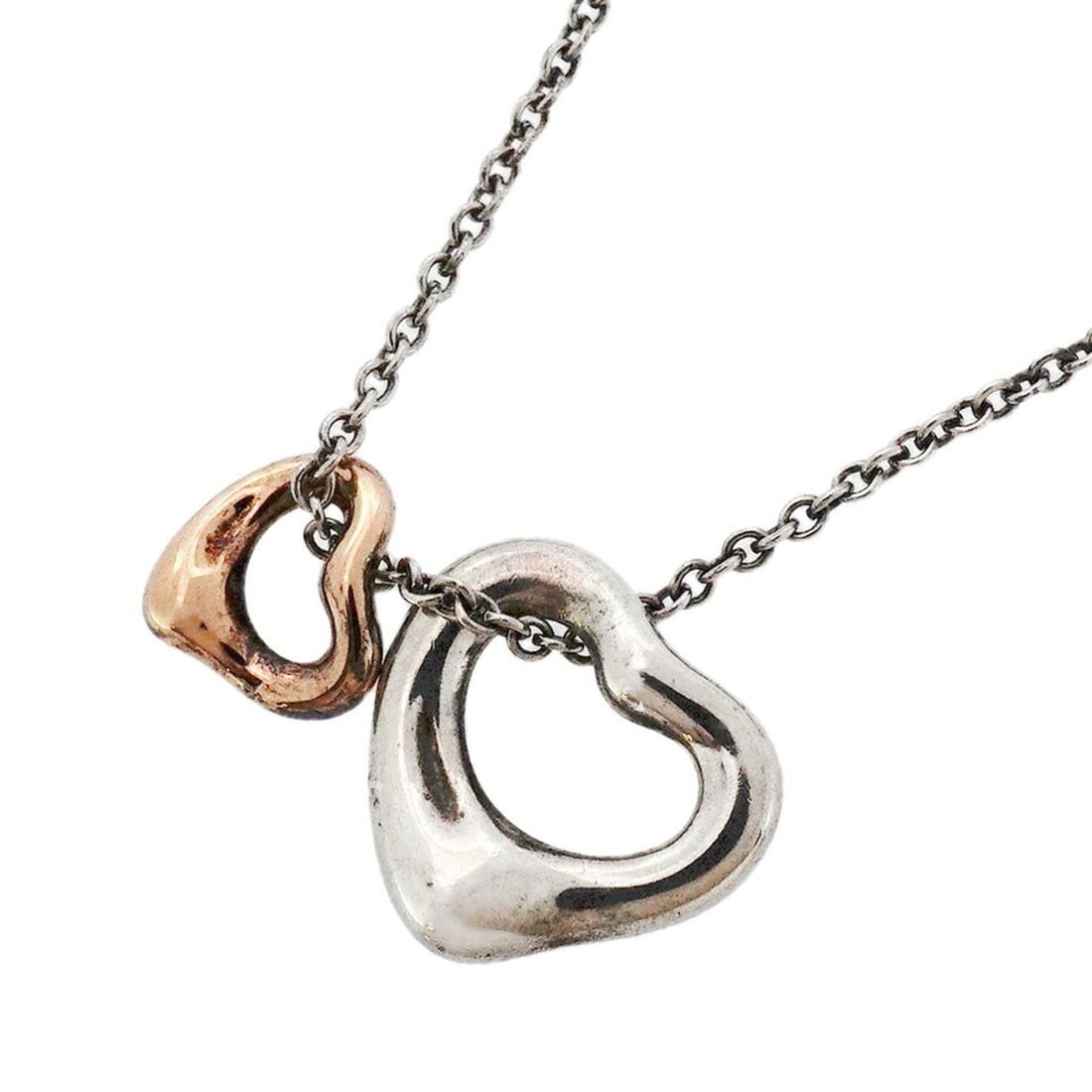 Tiffany Double Heart Necklace in 18K Pink Gold and 925 Silver for Women, P2051678: --- Catalog ---Category: SizePendant Size: 10mm x 11.1mm / 0.39'' x 0.43''Neck Circumference: 41 cm / 16.14''Category: DesignGender: WomenMaterial: Pink gold (18K), Silver 925Necklace Type: NecklaceCa