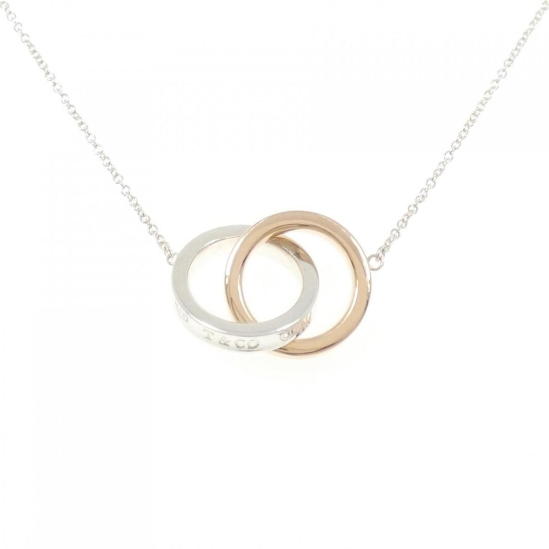 Tiffany 1837 Interlocking Circle Necklace: --- Catalog ---Category: SizePendant Size: 14.6mm x 21.6mm / 0.57'' x 0.85''Neck Circumference: 41 cm / 16.14''Category: DesignGender: WomenMaterial: Silver 925Pendant Type: PendantNecklace Type: