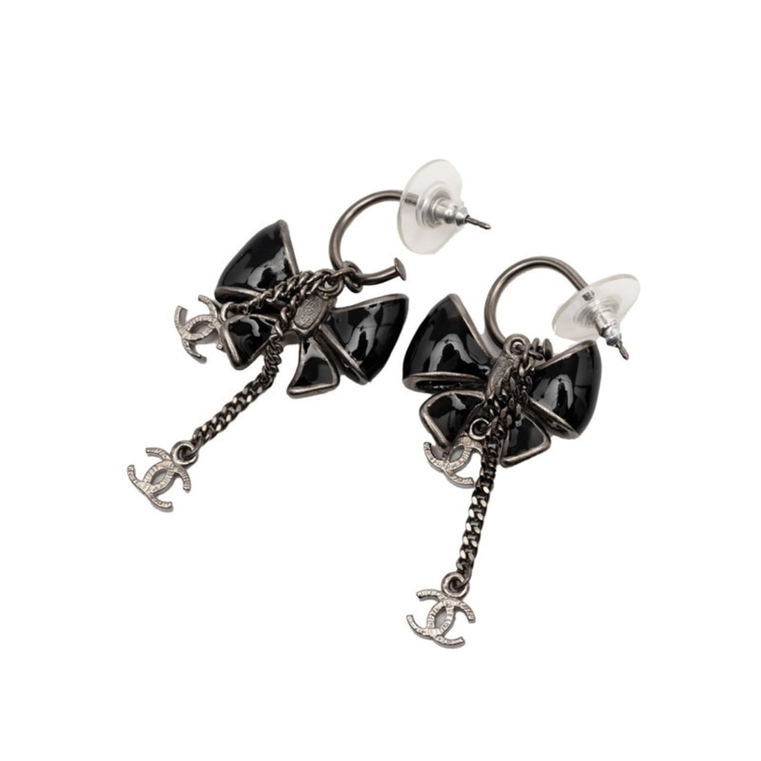 CHANEL Coco Mark Ribbon Earrings in Black and Silver Metal, Women's: --- Catalog ---Category: SizeSize (HxWxD): 48.30mm x 22.80mm / 1.90'' x 0.90''Category: DesignType: Stud earringsColor: Black, SilverGender: WomenMaterial: MetalCategory: GeneralBrand: Chanel--- Item