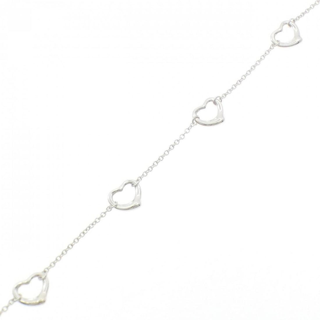 Tiffany Open Heart 5P Bracelet: --- Catalog ---Category: SizeLength: 19cm / 7.48''Category: DesignType: Charm braceletGender: WomenMaterial: Silver 925Category: GeneralLine: 1837 SeriesBrand: Tiffany--- Item List ---Section: Conditi