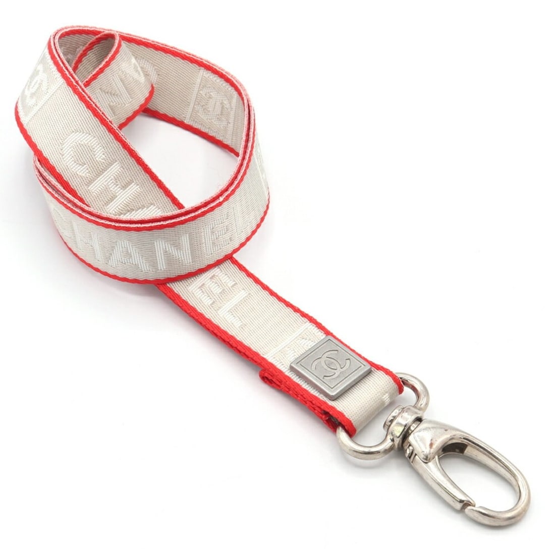 Chanel Neck Strap Sport Line Gray Red Canvas 05B 2005 Model Keychain Key Ring Women's CHANEL: --- Catalog ---Category: DesignType: KeyringColor: Gray, Red colorGender: WomenMaterial: CanvasCategory: GeneralBrand: ChanelCountry of Origin: France--- Item List ---Section: ConditionRanking: Rank A