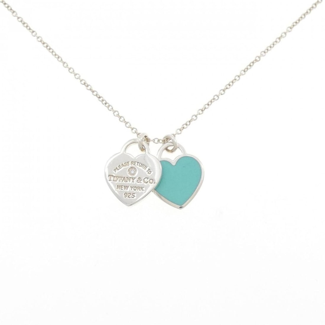 Tiffany Return to Necklace: --- Catalog ---Category: SizePendant Size: 13.4mm x 10mm / 0.52'' x 0.39''Neck Circumference: 41 cm / 16.14''Category: DesignColor: SilverStone: DiamondGender: WomenMaterial: Silver 925Pendant Type: