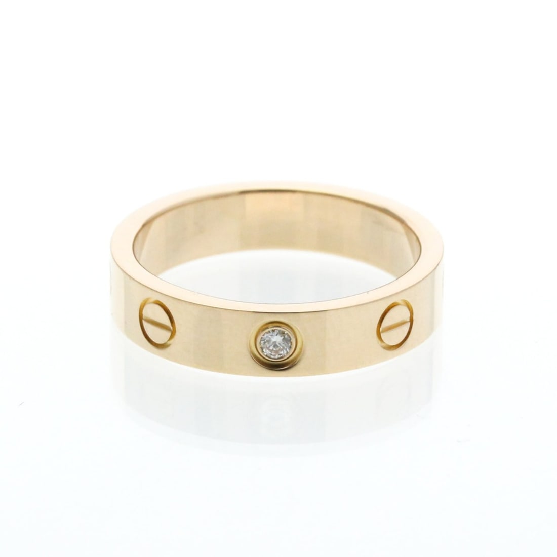 Cartier Mini Love Ring 1P Diamond B4050749 Pink Gold (18K) Fashion Diamond Band Ring Pink Gold: --- Catalog ---Category: SizeWidth: 4mm / 0.16''Weight: 4.4g / 0.15oz.JP Size: 9US Size: 4 3/4Brand Size: 49Category: DesignType: Band ringColor: Pink goldMetal: GoldStone: DiamondStyle: FashionGender