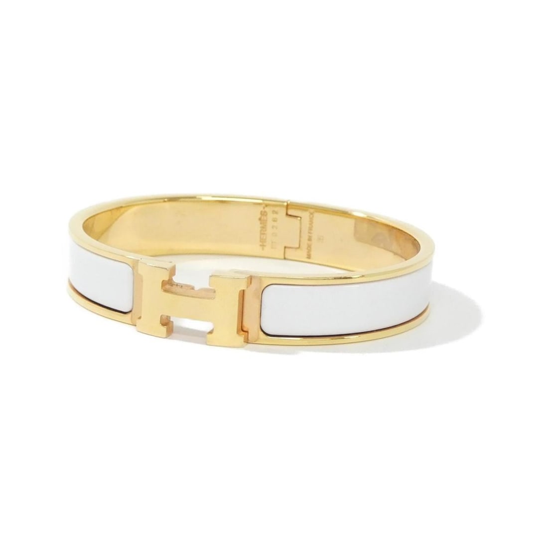 Hermes Click H GM 700001FO Bracelet: --- Catalog ---Category: SizeLength: 17cm / 6.69''Category: DesignType: Charm braceletColor: Rose gold, WhiteGender: Women,MenCategory: GeneralMPN: 700001FOBrand: Hermes--- Item List ---Section: Condi