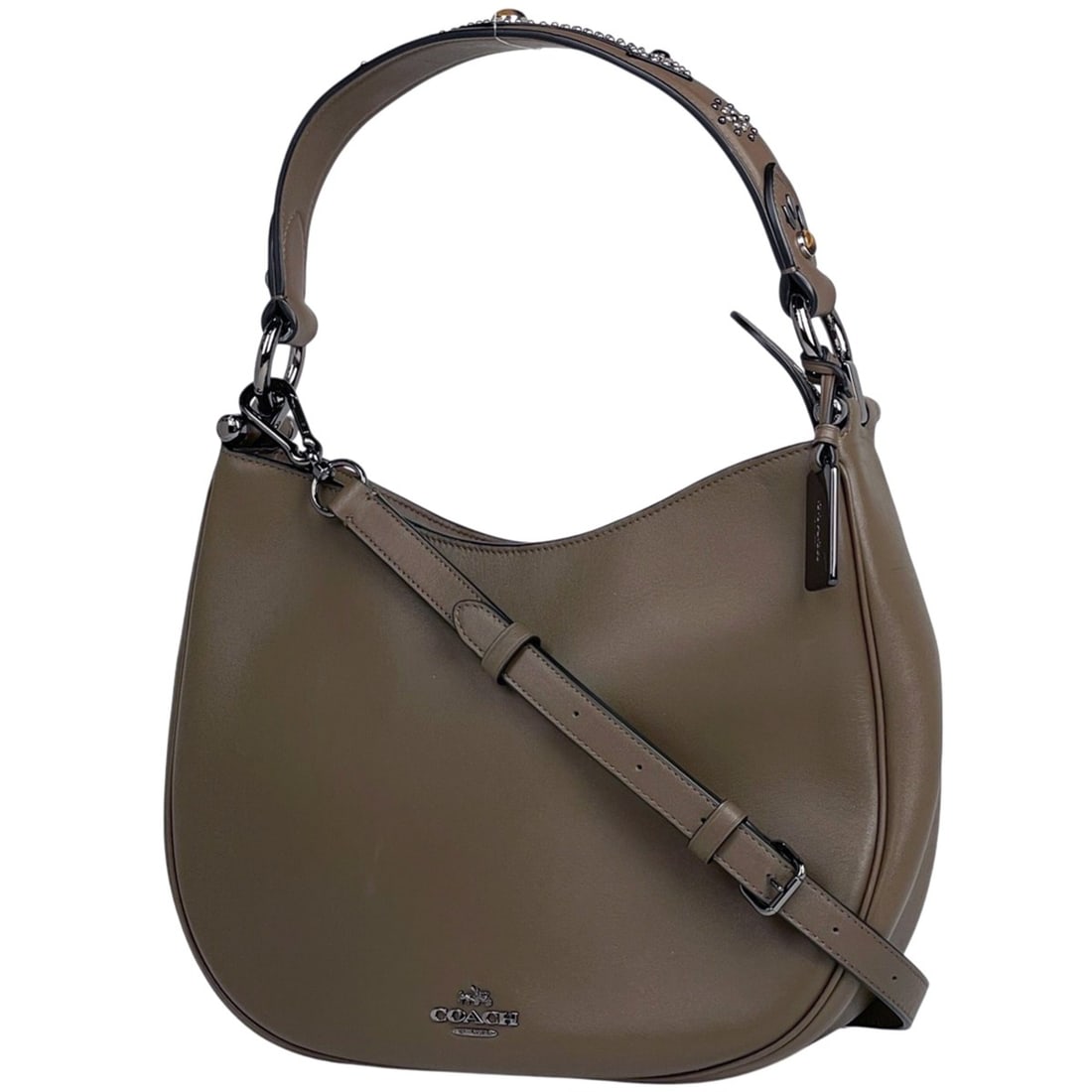 Coach logo handbag with Western rivets, 2-way shoulder bag, and brown leather (57119) for women.: --- Catalog ---Category: SizeSize (HxWxD): 20cm x 26.5cm x 7cm / 7.87'' x 10.43'' x 2.75''Category: DesignType: Handbag, Shoulder bagColor: BrownGender: WomenMaterial: Leather Category: GeneralBrand: