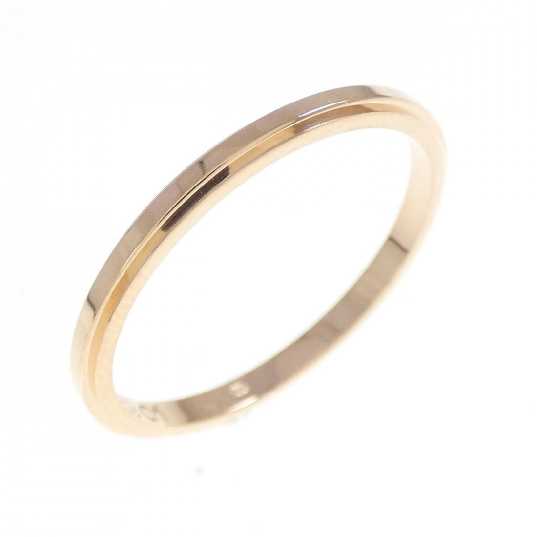 Cartier D'Amour Ring: --- Catalog ---Category: SizeUS Size: 7Brand Size: 54Category: DesignType: Band ringColor: Pink goldGender: WomenMaterial: Pink gold (18K)Category: GeneralBrand: Cartier--- Item List ---Section: Condi